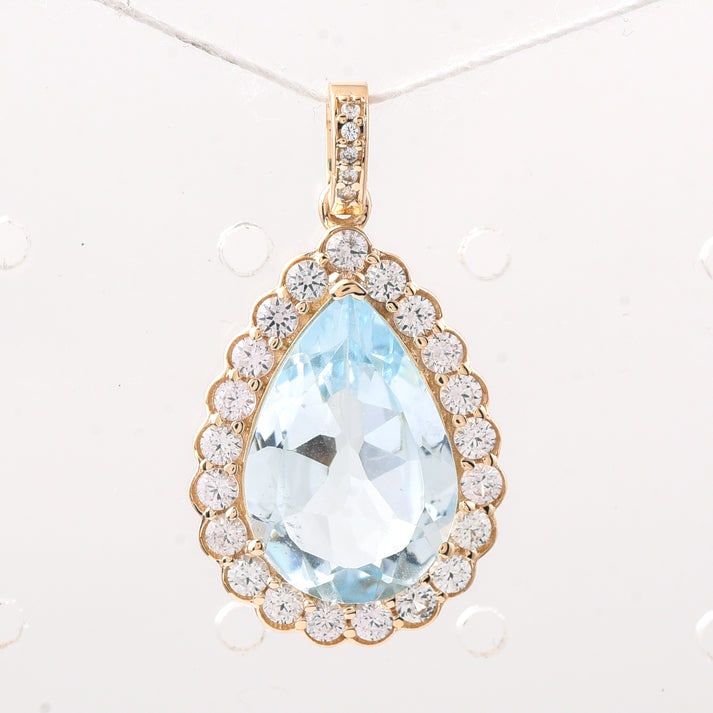 4.95 Ct Pear Aquamarine 9K Gold Pendant: 4.95 Total Carat Aquamarine 9K Gold Pendant Specifications: Total Weight 2.234 g Center Gemstone Aquamarine Gemstone Carat Weight 4 Carats Gemstone Measurements 15.10X10.10X5.20 mm Additional Gemstone