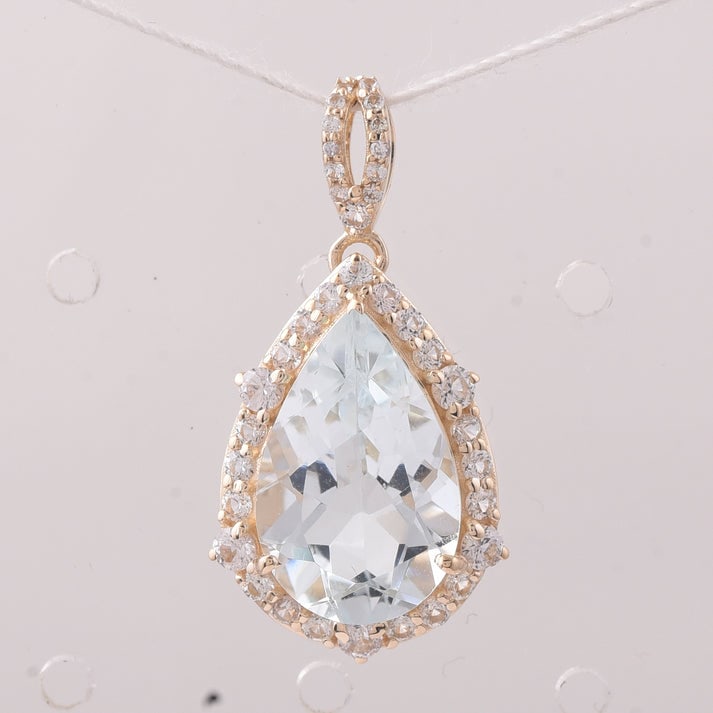 4.38 Ct Pear Aquamarine 9K Gold Pendant: 4.38 Total Carat Aquamarine 9K Gold Pendant Specifications: Total Weight 2.136 g Center Gemstone Aquamarine Gemstone Carat Weight 3.76 Carats Gemstone Measurements 14.20X9.20X6 mm Additional