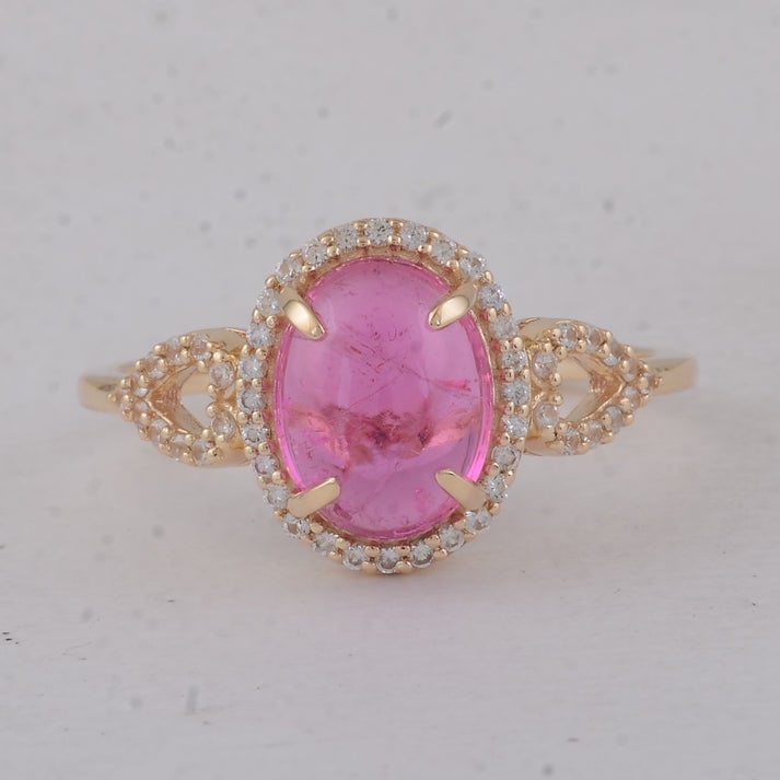 2.52 Ct Oval Tourmaline 9K Gold Ring: 2.52 Total Carat Tourmaline 9K Gold Ring Specifications: Total Weight 2.12 g Center Gemstone Tourmaline Gemstone Carat Weight 2.3 Carats Gemstone Measurements 9X7X4.20 mm Additional Gemstones White