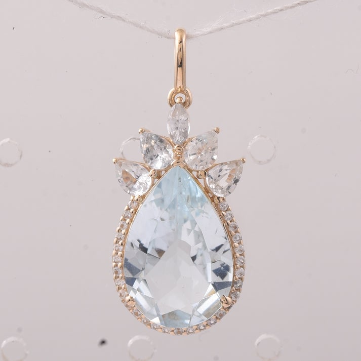 4.68 Ct Pear Aquamarine 9K Gold Pendant: 4.68 Total Carat Aquamarine 9K Gold Pendant Specifications: Total Weight 2.021 g Center Gemstone Aquamarine Gemstone Carat Weight 3.83 Carats Gemstone Measurements 15X10X5.20 mm Additional Gemstones