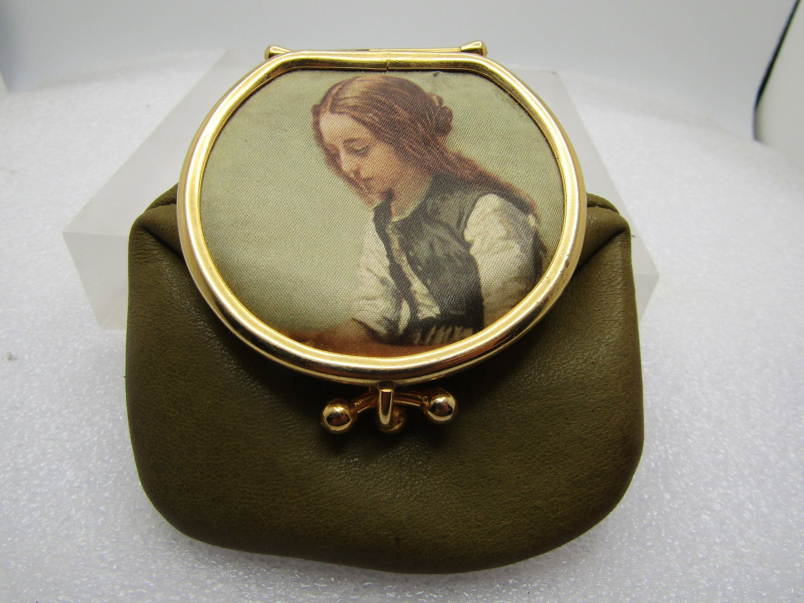 Vintage Genuine Italian Leather Coin Purse, Girl Image on Front. 1960's: Title: Vintage Genuine Italian Leather Coin Purse, Girl Image on Front. 1960's Description: Vintage Genuine Italian Leather Coin Purse, Girl Image on Front. 1960's. This has a folded over top with a h