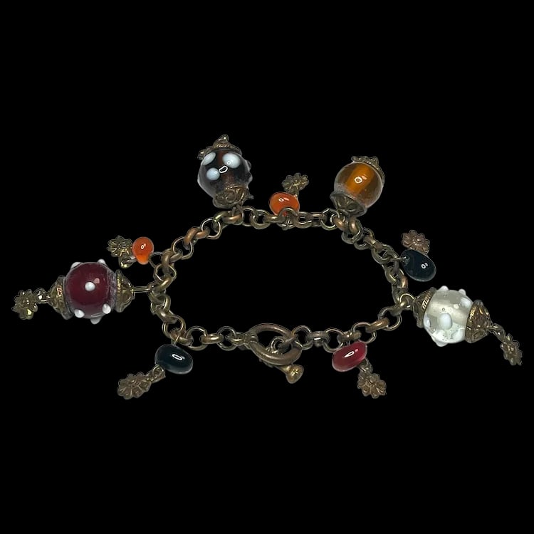 Vintage Art Glass Bracelet on Bronze Tone Chain: Title: Vintage Art Glass Bracelet on Bronze Tone Chain Description: Vintage Art Glass Bracelet on Bronze Tone Chain. Metal, Glass. Weighs 42 grams. Measure 7.5 inches length Date/Period: Vintage Mater