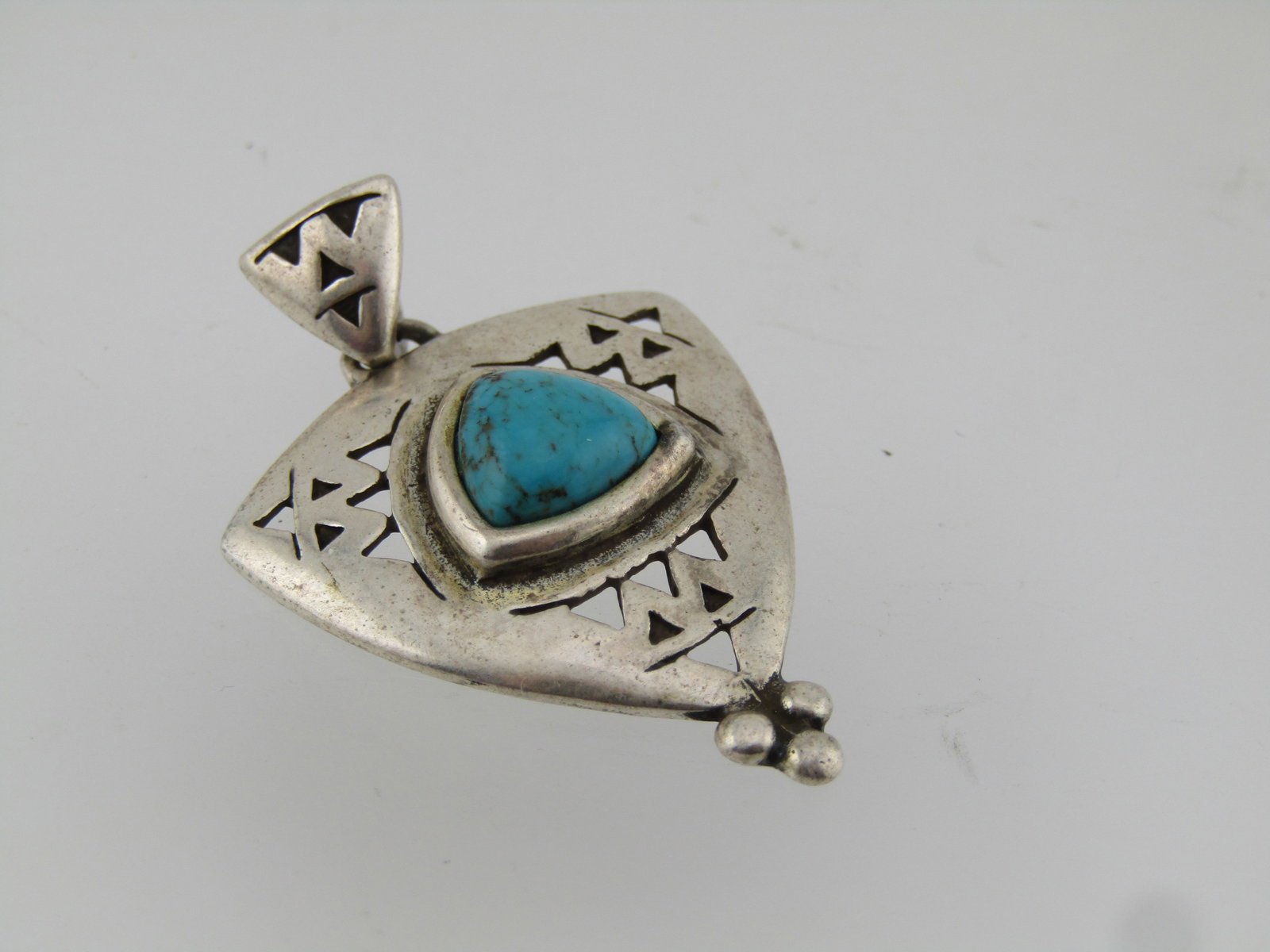 Sterling Carolyn Pollack Relios Turquoise Pendant, 1990's: Title: Sterling Carolyn Pollack Relios Turquoise Pendant, 1990's Description: Sterling Carolyn Pollack Relios Turquoise Pendant, 1990's. This has a triangular bail with a triangular pendant with