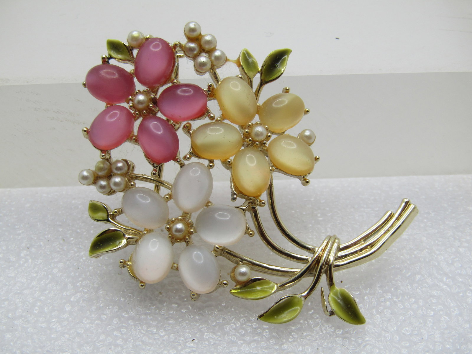 Vintage Floral Brooch, Faux Pearls and Glass Cateye Stones, 1960's,: Title: Vintage Floral Brooch, Faux Pearls and Glass Cateye Stones, 1960's, Description: Vintage Floral Brooch, Faux Pearls and Glass Cateye Stones, 1960's this is appx. 2.25" tall and 1.25" wide. Curv