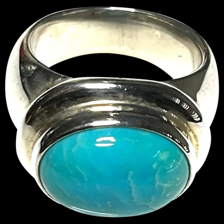 Estate ESPO Sterling Silver & Turquoise Statement Ring: Title: Estate ESPO Sterling Silver & Turquoise Statement Ring Description: Estate ESPO Sterling Silver & Turquoise Statement RingHallmarked: 925 ESPOWeighs: 13.7 gramsMeasures US Ring SIze: 8.5 Date/P