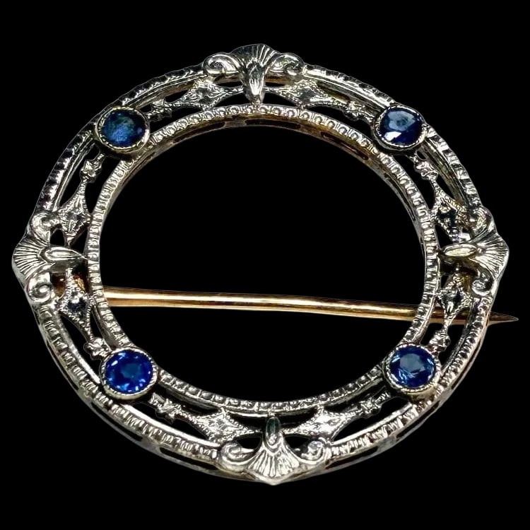 Antique 14k White Gold Art Deco Sapphire Brooch: Title: Antique 14k White Gold Art Deco Sapphire Brooch Description: Antique 14k White Gold Art Deco Sapphire Brooch . Hallmarked: 14k white gold front/yellow gold back. Weighs: 1.4 grams. Measures: 1 