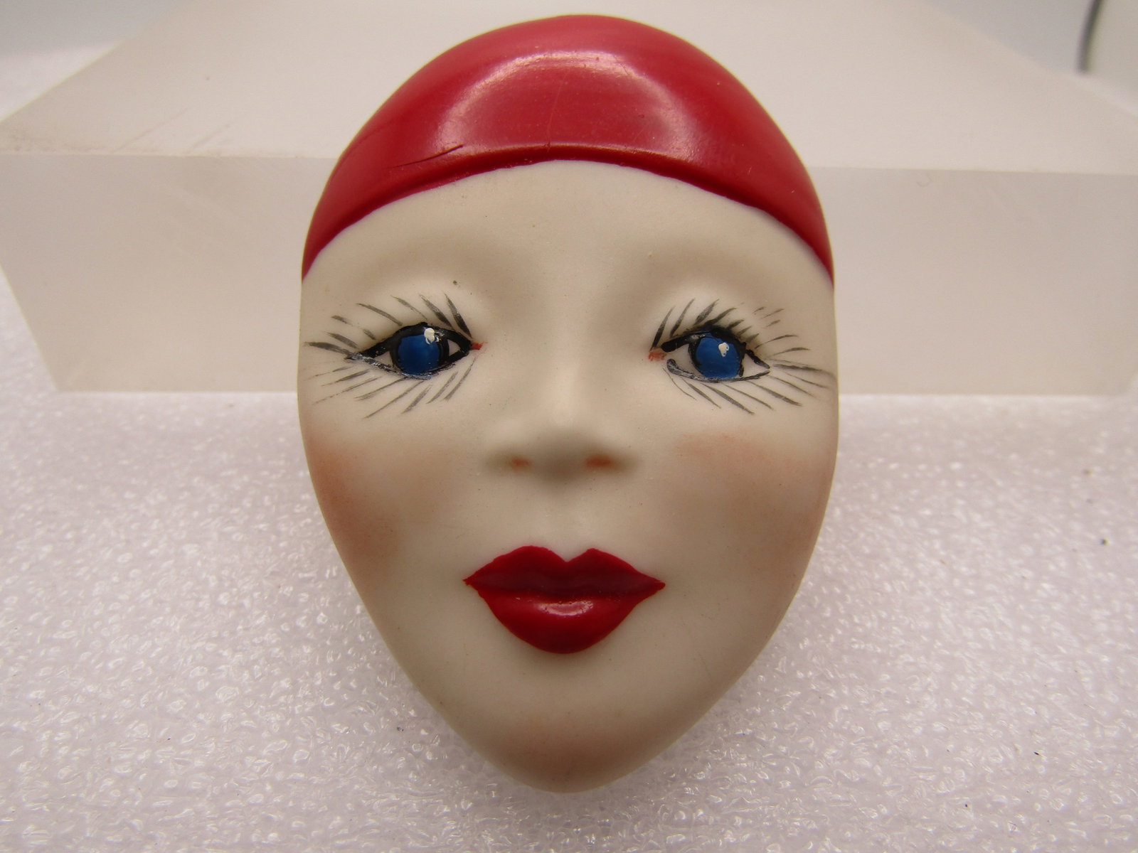Vintage Painted French Mime Face Brooch, Porcelain, 1980's: Title: Vintage Painted French Mime Face Brooch, Porcelain, 1980's Description: Vintage Painted French Mime Face Brooch, Porcelain, 1980's. It is appx. 2.25" tall and 1.25" wide. Blue Eyes, Red Hat and