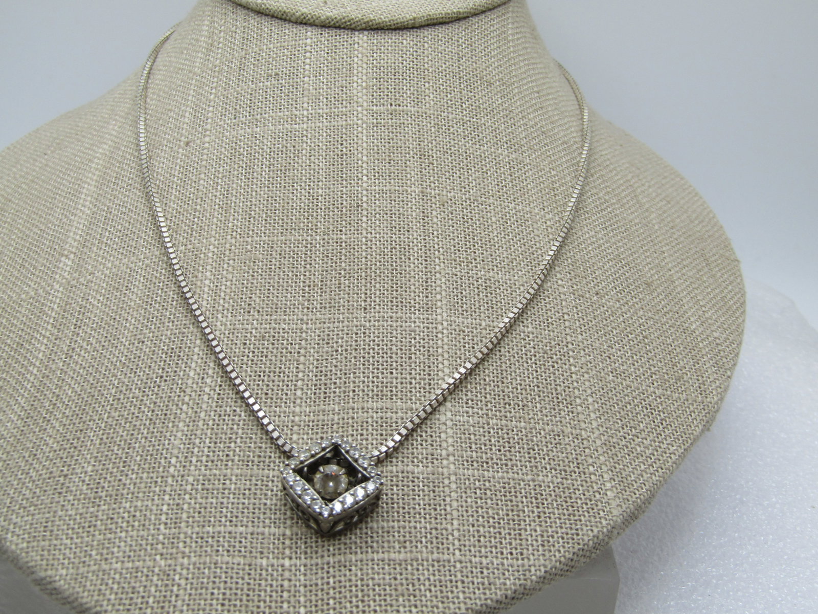 Vintage Sterling Floating CZ Necklace, 22",1980's, Signed: Title: Vintage Sterling Floating CZ Necklace, 22",1980's, Signed Description: Vintage Sterling Floating CZ Necklace, 22",1980's, Signed H.925 and marked CZ. the slide pendant is a floating CZ in the c