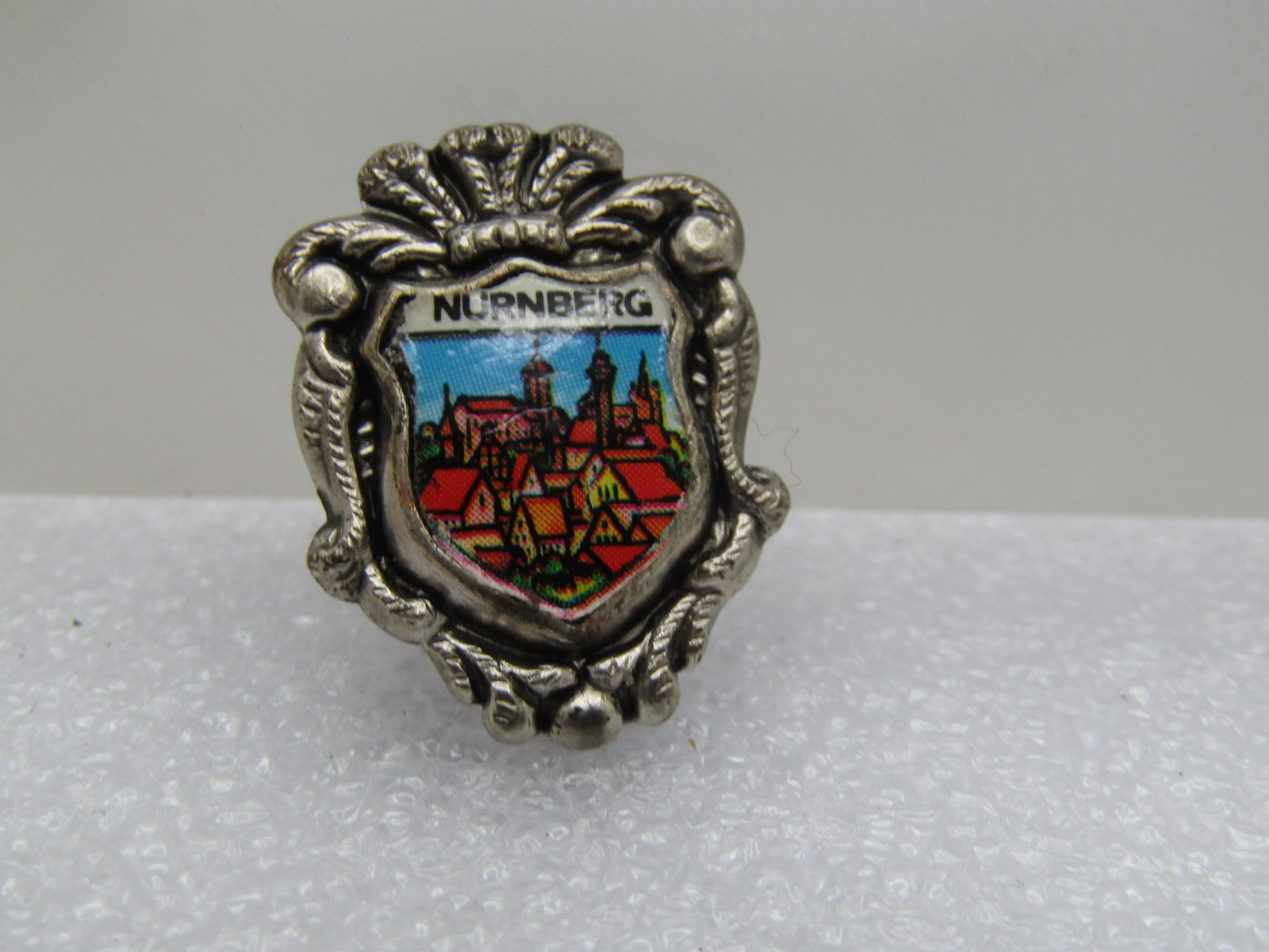 Vintage Nurnberg Crown Crest Brooch, C-Clasp, 1950's-1960's: Title: Vintage Nurnberg Crown Crest Brooch, C-Clasp, 1950's-1960's Description: Vintage Nurnberg Crown Crest Brooch, C-Clasp, 1950's-1960's. this has a pictoral front with Nurnberg over the town scene