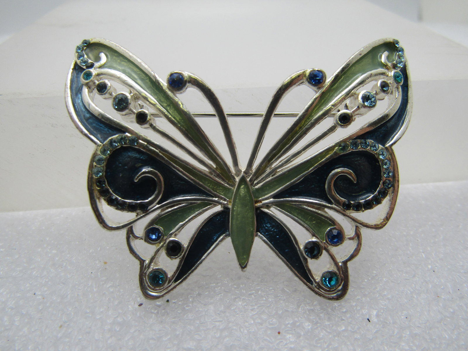 Pair Liz Claiborne Butterfly Brooches, Enameled/Rhinetone, 1990's: Title: Pair Liz Claiborne Butterfly Brooches, Enameled/Rhinetone, 1990's Description: Pair Liz Claiborne Butterfly Brooches, Enameled/Rhinetone, 1990's. Blue and green enameled with recessed and