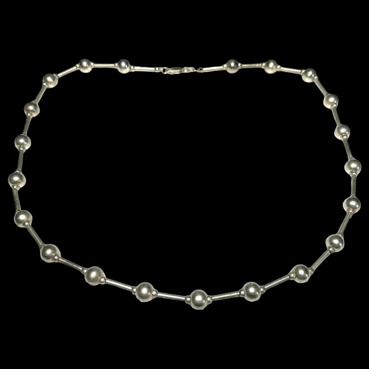 Vintage Sterling Silver Bead Ball Tube Necklace: Title: Vintage Sterling Silver Bead Ball Tube Necklace Description: Vintage Sterling Silver Bead Ball Tube Necklace. Hallmarked: 925 HAN. Weighs: 21.2 grams. Measures Approx: 18 inches length