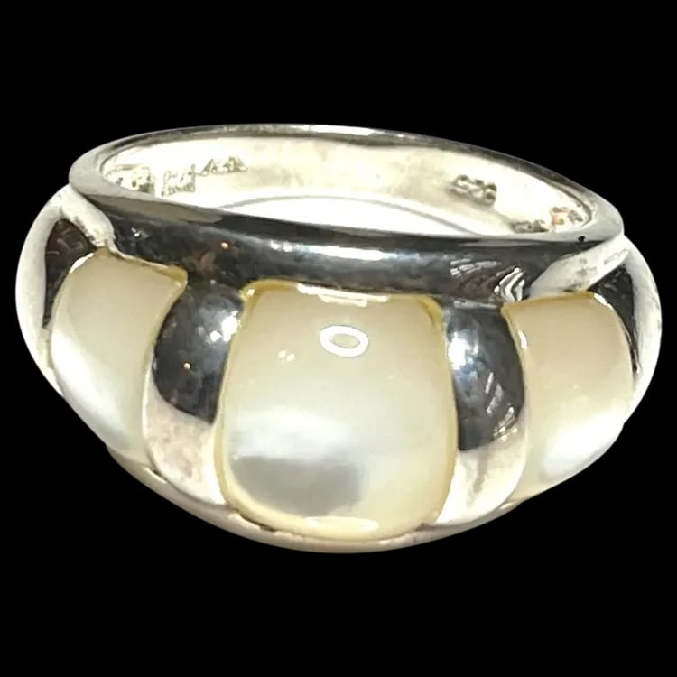 Estate Sterling Silver Signed Cocktail Ring: Title: Estate Sterling Silver Signed Cocktail Ring Description: Estate Sterling Silver Signed Cocktail RingHallmarked: 925 SignedWeighs: 8 gramsMeasures US Ring SIze: 8.75 Date/Period: Estate Material