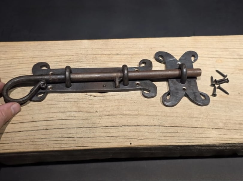Pennsylvania German Slide Latch Hand Forged Primitive Iron: Pennsylvania German "Rams Horn" Slide Latch | Hand-Forged Primitive IronThis is a museum-quality reproduction of the classic Rams Horn slide bolt, a staple of 18th and 19th-century Pennsylvania German