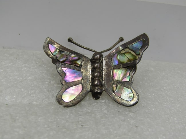 Vintage Sterling Inlaid Abalone Butterfly Brooch, Mid-Century, Signed: Vintage Sterling Inlaid Abalone Butterfly Brooch, Mid-Century, Signed Playa and another word that can't be read. Markedd .925 with a weight of 2.92 gr. The pin is appx. mid-century it does have some c