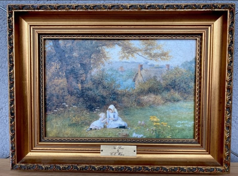 Antique framed painting by C.E.Wilson - The Picnic: Title: Antique framed painting by C.E.Wilson - The PicnicMaker:CONSORT PICTURES C.P.PRODUCTIONS LTDOrigin: IRELANDDate/Period:UnknownMaterials:Wood, CanvasSize:Size: 37 x 26 x 4 cmDescription:Antique 