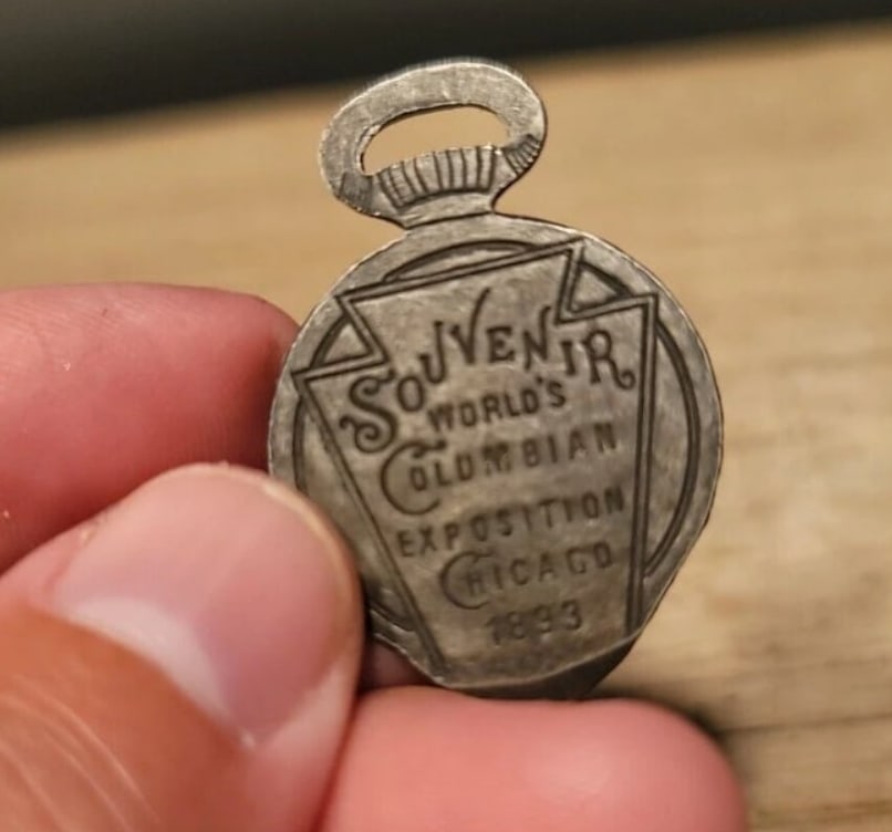 Pocket Watch Case Opener Souvenir: 1 1/2" TallNice souvenir watch case opener. Items like this were given as useful souvenirs back in the day. Hard to tell its age.