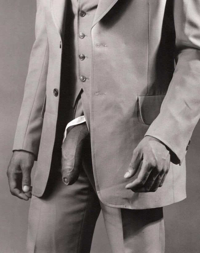 MAPPLETHORPE - Man in Polyester Suit, 1980: Artist: MAPPLETHORPEPrint Title:Man in Polyester Suit, 1980Medium: Duotone PrintPrinted 1990s in the ItalyImage size (inches) approx. 10 x 8”Robert Mapplethorpe was an American photographer, kno