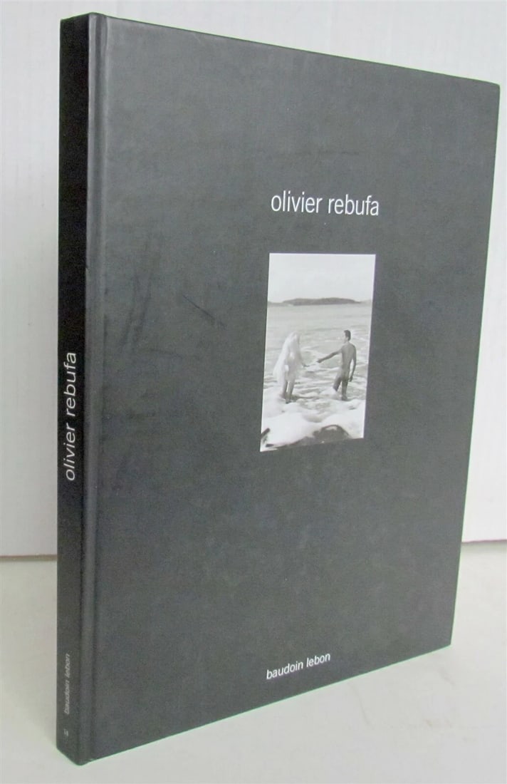 OLIVIER REBUFA ILLUSTRATED PHOTOBOOK: Printed in 2006 Hard bound Fully illustrated in b/w Size 9 1/4 by 12" Text in English and French Perfect condition Reserve: $70.00 Shipping: Domestic: Flat-rate of $25.00 to anywhere within