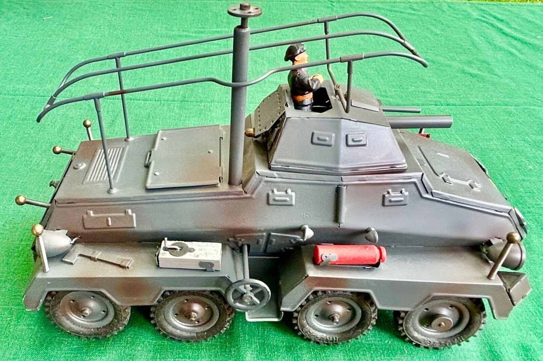 Hausser "Spahwagen" (communication truck) catalog no.744 (Made in Germany), powerful windup with: Hausser "Spahwagen" (communication truck) catalog no.744 (Made in Germany), powerful windup with brake and forward/reverse,antenna can be raised/lowered via side wheel.has Morse code table, working he