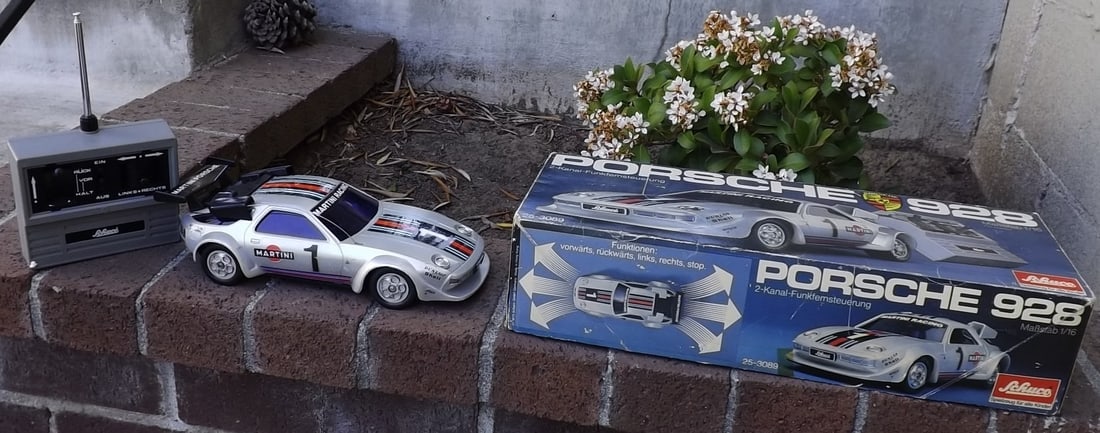 Schuco Porsche 928, Made in Germany 1970's ,radio controlled forward/reverse and left/right: Schuco Porsche 928, Made in Germany 1970's ,radio controlled forward/reverse and left/right steering,c10 in c8 box . Reserve: $159.00 Shipping: Domestic: Flat rate of $30.00 to anywhere within the