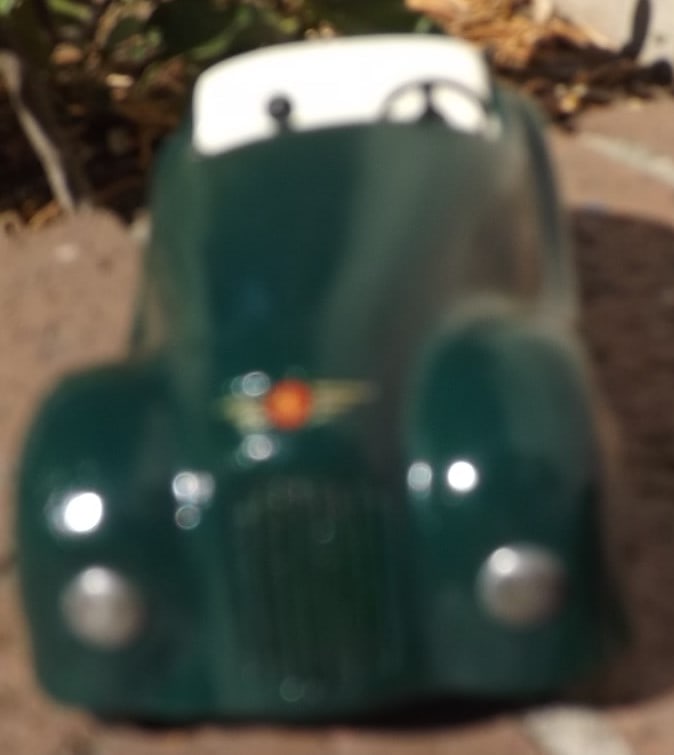 Jibby, Made in Switzerland 1954-56 , powerful windup motor, rack and pinion steering, all insignias - 2