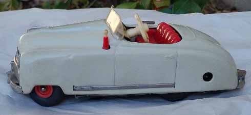 Schuco Radio 4012 (made in US Zone Germany,) two windup motors, one propels the car, the other one: Schuco Radio 4012 (made in US Zone Germany,) two windup motors, one propels the car, the other one propels a music box (the "radio"), rack and pinion steering, functional handbrake, c9 . Reserve: $236