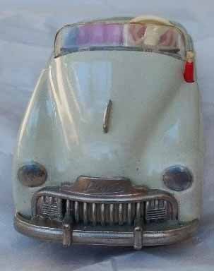 Schuco Radio 4012 (made in US Zone Germany,) two windup motors, one propels the car, the other one - 2