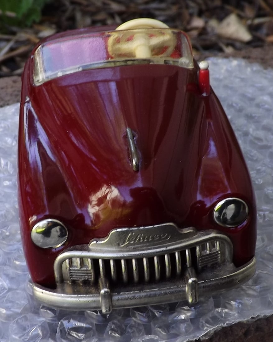 Schuco Radio 4012 (made in US Zone Germany,) two windup motors, one propels the car, the other one - 2