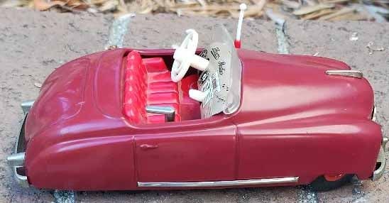 Schuco Radio 4012 (made in US Zone Germany,) two windup motors, one propels the car, the other one: Schuco Radio 4012 (made in US Zone Germany,) two windup motors, one propels the car, the other one propels a music box (the "radio"), rack and pinion steering, functional handbrake, c10 , Reserve: $28