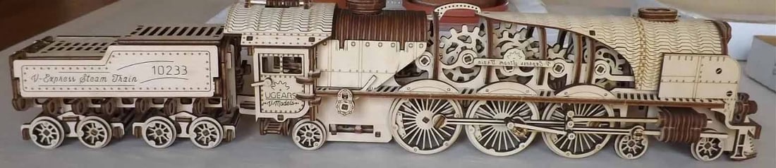 One of a kind windup locomotive, with track, c10,.: One of a kind windup locomotive, with track, c10,. Reserve: $279.00 Shipping: Domestic: Flat rate of $55.00 to anywhere within the contiguous U.S. International: Flate rate of $85.00 . International