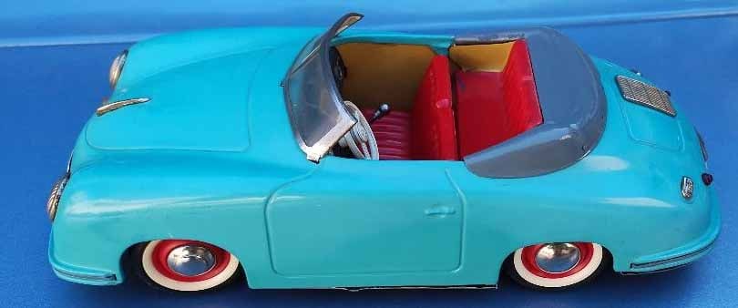 Distler Porsche car (Made in Germany), battery driven, realistic manual transmission with two speeds: Distler Porsche car (Made in Germany), battery driven, realistic manual transmission with two speeds forward, neutral and reverse on the floor, c9,. Reserve: $559.00 Shipping: Domestic: Flat rate of $