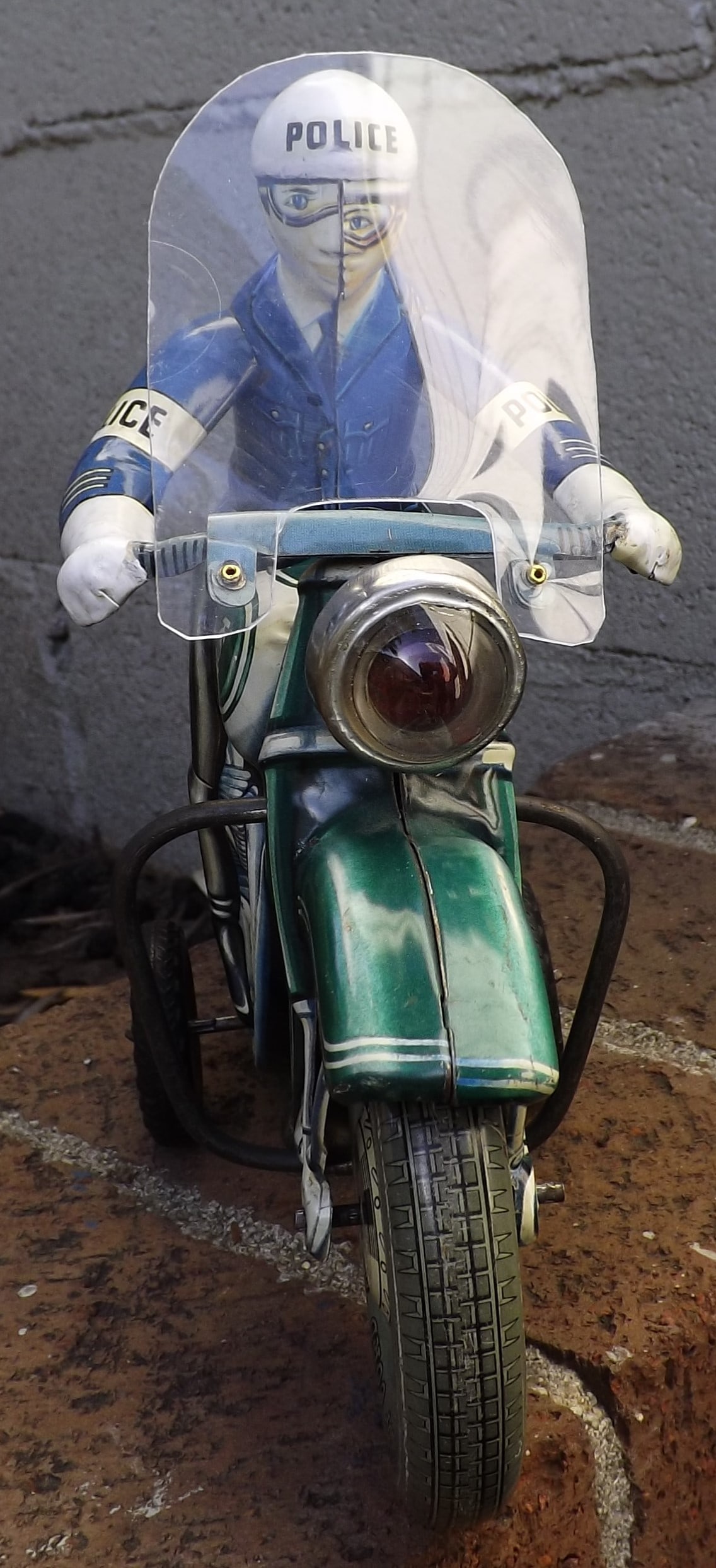Tippco Police Motorcycle with battery operated headlight.This is the much rarer version that has a - 2