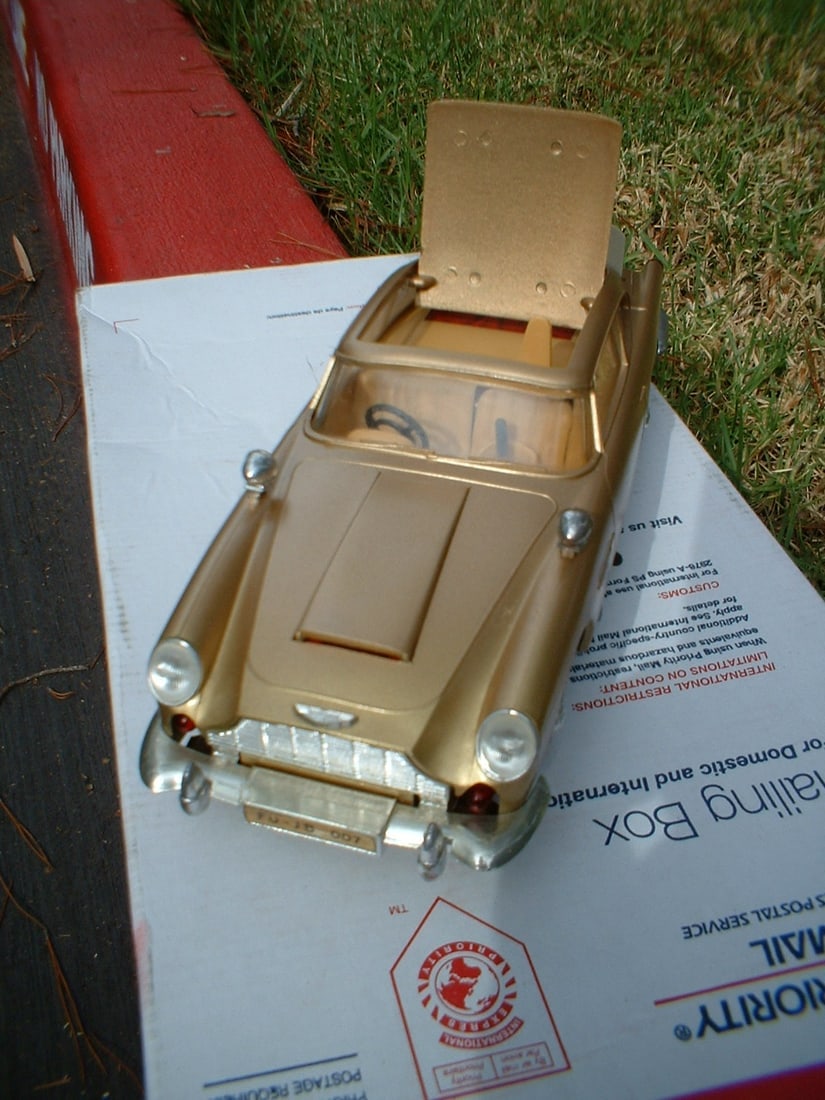 Gama 4900, "FU-JB 007" (Made in Western Germany) James Bond Aston Martin, the much rarer German: Gama 4900, "FU JB 007" (Made in Western Germany) James Bond Aston Martin, the much rarer German version,all windup variant, the guns come out from the front , with "rat tat tat" sound and flickering