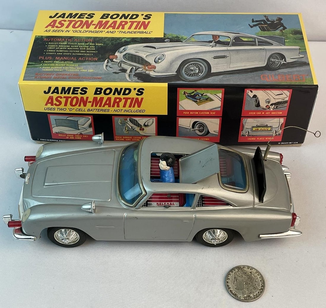 A.C.Gilbert James Bond Aston Martin DB5 (Made in Japan), the guns come out from the front ,battery: A.C.Gilbert James Bond Aston Martin DB5 (Made in Japan), the guns come out from the front ,battery operated, with "rat tat tat" sound and flickering fire, the "bad guy" gets ejected from his seat