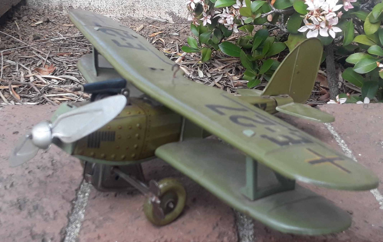 Tippco (made in Germany before WWII) military biplane , complex windup motor drives landing gear: Tippco (made in Germany before WWII) military biplane , complex windup motor drives landing gear wheels, prop and sparking machine gun, c9 . Reserve: $1,120.00 Shipping: Domestic: Flat rate of $50.00 