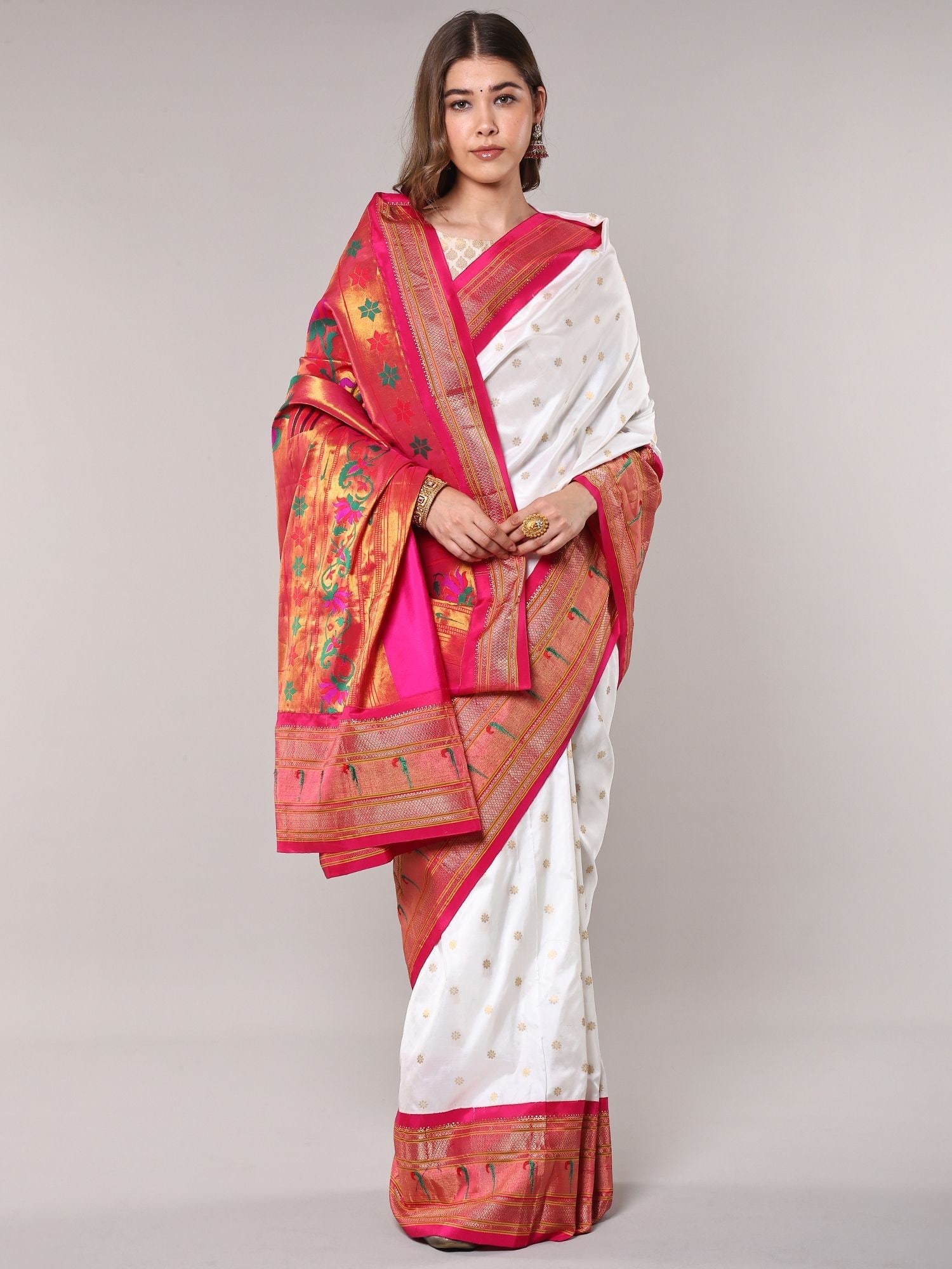 Bright-White Pure Silk Bootis woven Paithani Saree with Intricate Zari work and Lotus Vine Pallu: Title:Bright-White Pure Silk Bootis woven Paithani Saree with Intricate Zari work and Lotus Vine Pallu from Bangalore Reference:itemcode : CA0011 Reserve: $409.00 Shipping: Domestic: Shipping rates