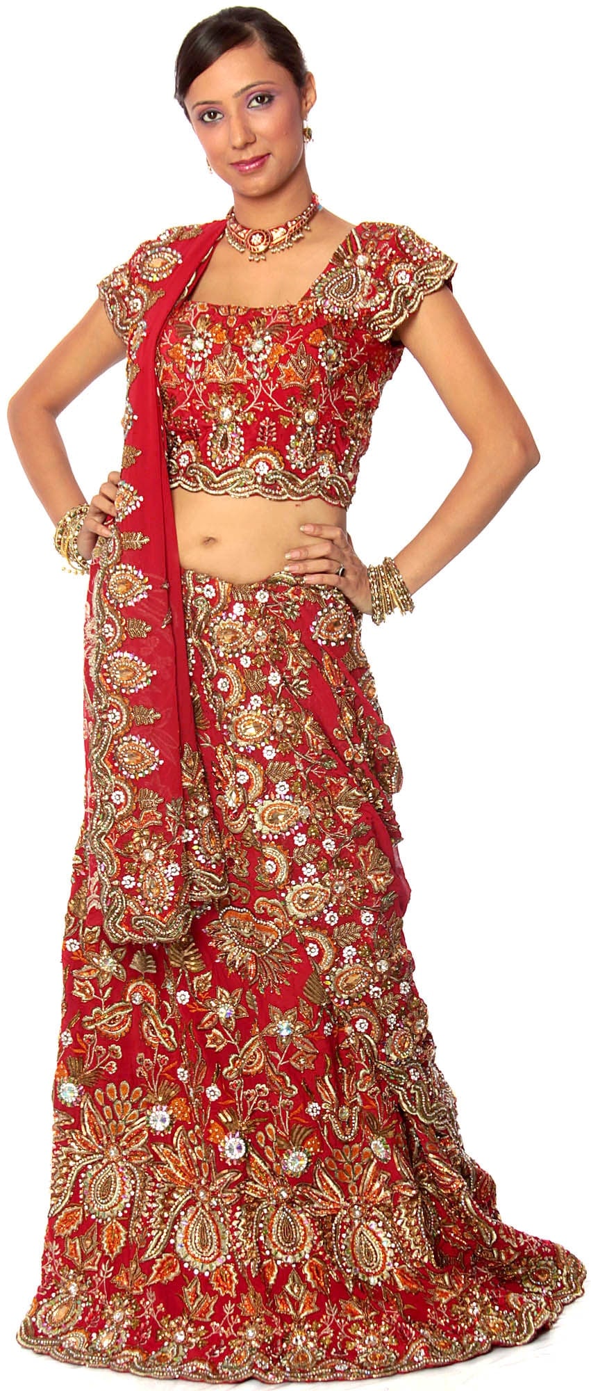 Three-Piece Bridal Red Lehenga With Dense Zardozi All Over: Title:Three-Piece Bridal Red Lehenga With Dense Zardozi All Over Description:A bride needs to be sensational on her wedding day, and the dress she chooses for the occasion is responsible for whether