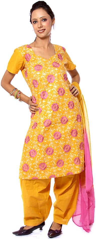 Mustard Salwar Kameez with All-Over Embroidered Chakras: Title:Mustard Salwar Kameez with All-Over Embroidered Chakras Description:This ensemble is more than just fabric in fact it is a celebration of warmth, joy, and the enchanting beauty of nature. The