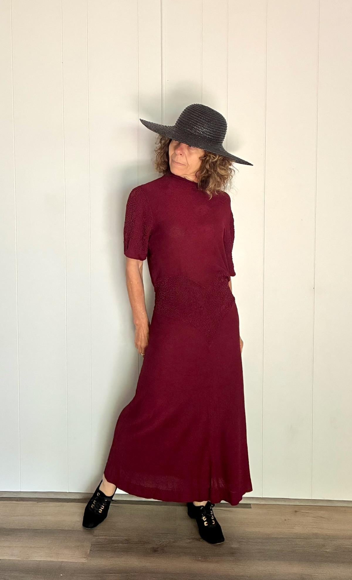 Vintage 1930s Red Sweater Dress Sz Large Up to US 16-18: Gorgeous merlot red (approx. Pantone 222) Jersey with boucle feel Cotton/rayon blend, we think Fantastic soutache - bodice and sleeves Drapey boatneck neckline Drop waist Buttons in back - 21! Tie in