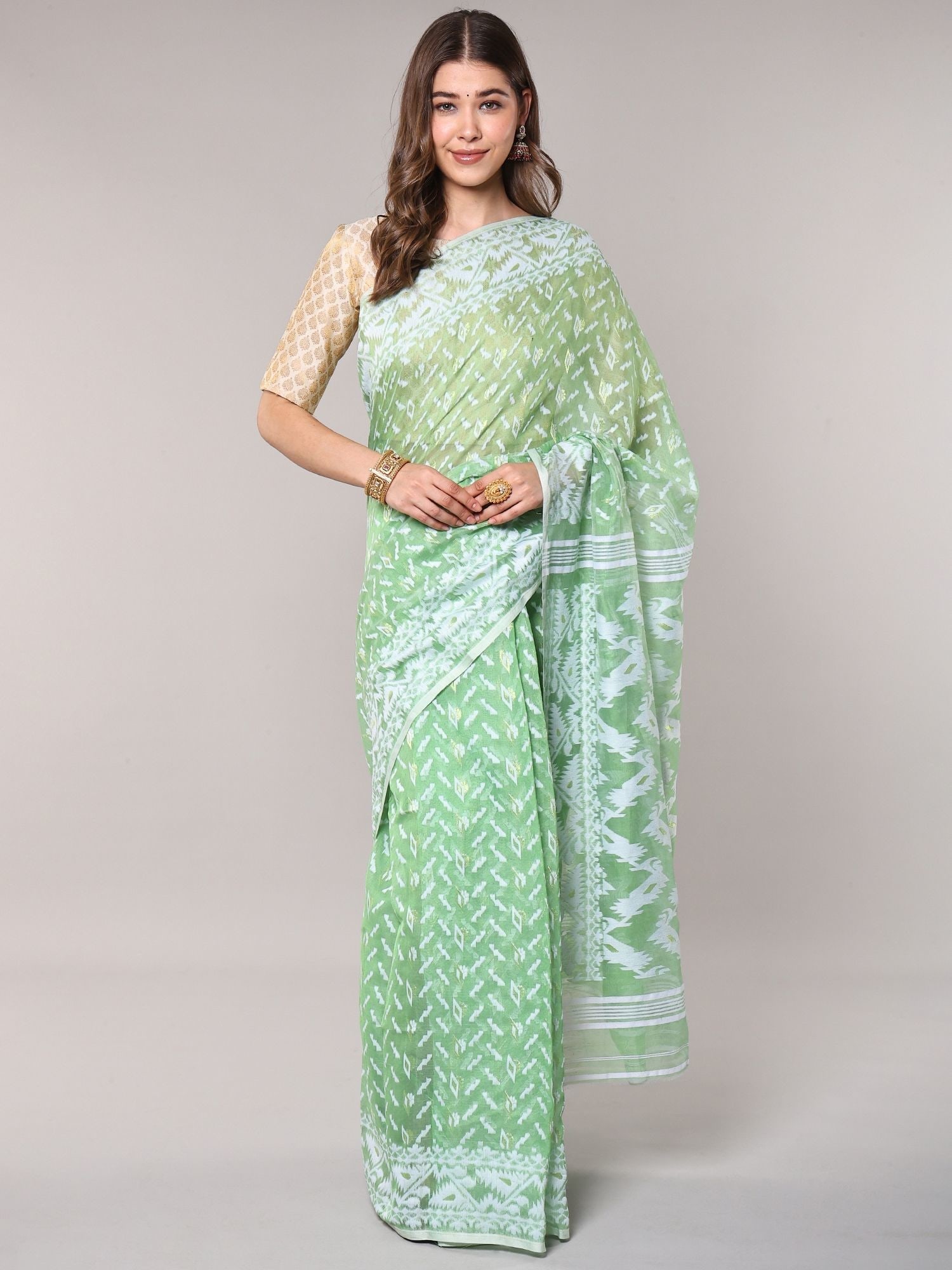 Absinthe-Green Jamdani Summer Saree from Bengal with All-Over Woven Motifs: Title:Absinthe-Green Jamdani Summer Saree from Bengal with All-Over Woven Motifs Reference:itemcode : CA0013 Reserve: $130.00 Shipping: Domestic: Shipping rates are determined by destination