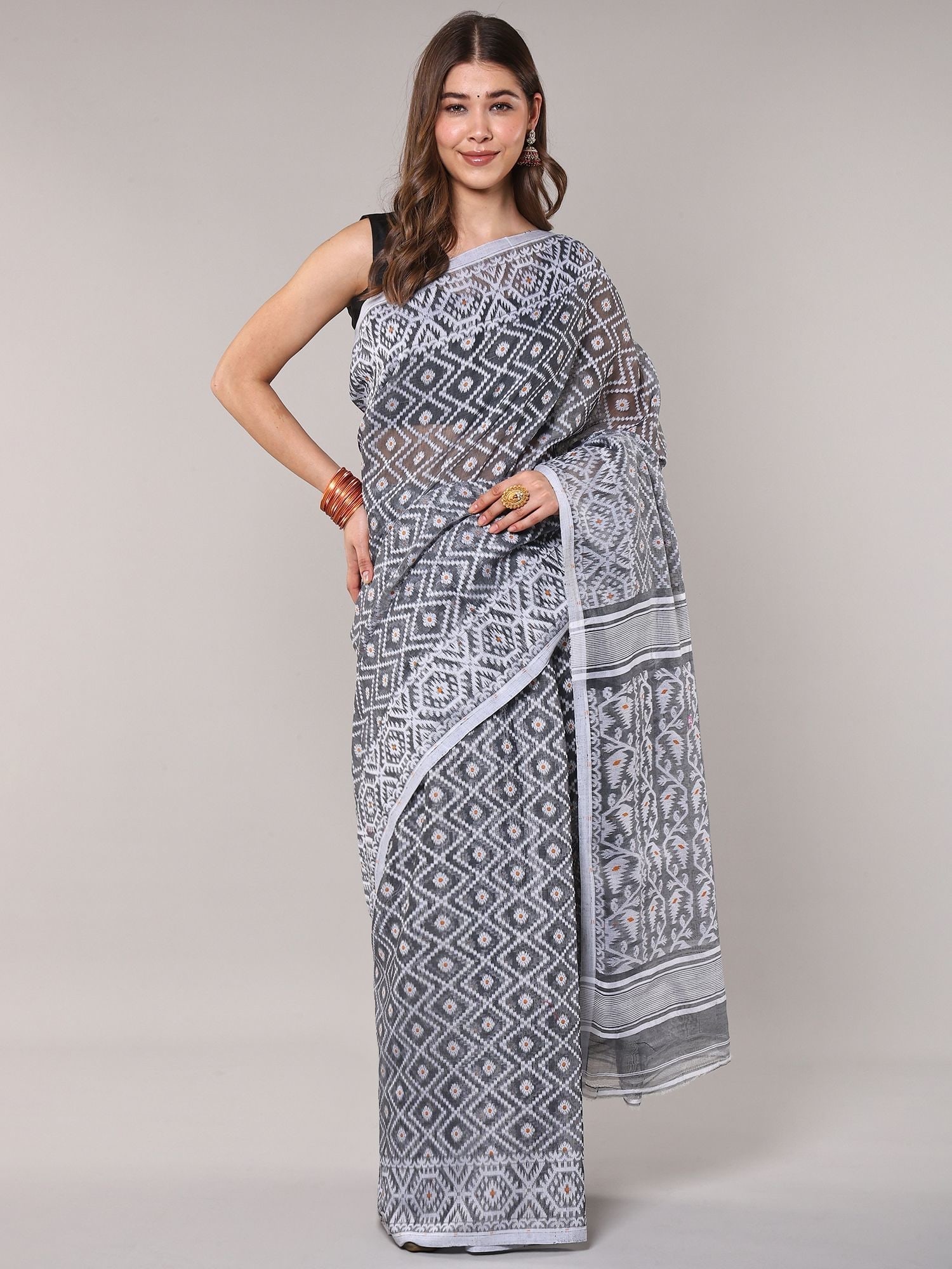 Dark-Shadow Dhakai Jamdani Saree with Woven Motifs from Bengal: Title:Dark-Shadow Dhakai Jamdani Saree with Woven Motifs from Bengal Reference:itemcode : CA0007 Reserve: $130.00 Shipping: Domestic: Shipping rates are determined by destination International: