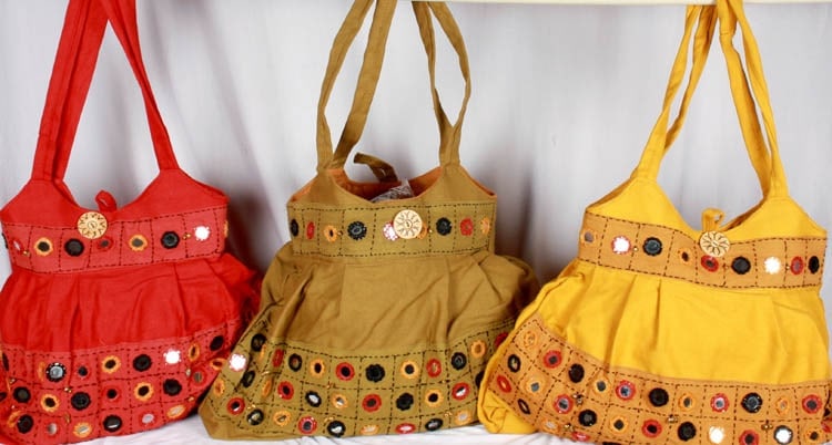 Lot of Three Hobo Bags with Mirrors: Title:Lot of Three Hobo Bags with Mirrors Description:Produced from pure cotton, each crescent-shaped hobo bag embodies the spirit of wanderlust and freedom reminiscent of its namesake. Adorned with