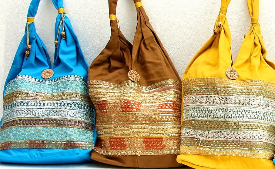 Lot of Three Gota Shoulder Bags with Sequins: Title:Lot of Three Gota Shoulder Bags with Sequins Description:Fashioned from pure cotton, these bags are adorned with elaborate Gota work and shimmering sequins, symbolising enchanting grace and