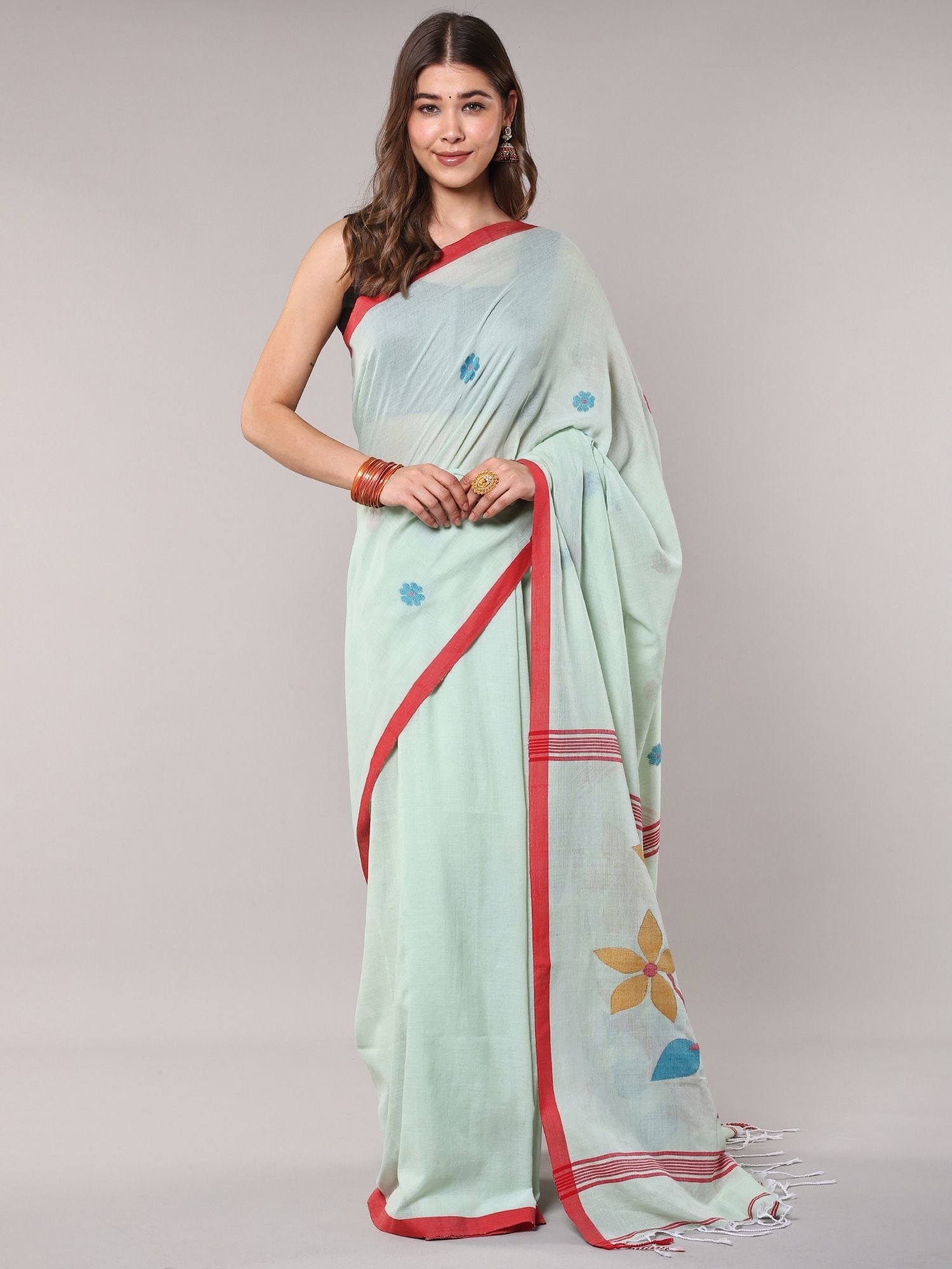 Green-Tint Pure Cotton Saree with Woven Bootis and Flowers on Pallu from Bengal: Title:Green-Tint Pure Cotton Saree with Woven Bootis and Flowers on Pallu from Bengal Reference:itemcode : CA0005 Reserve: $166.00 Shipping: Domestic: Shipping rates are determined by destination