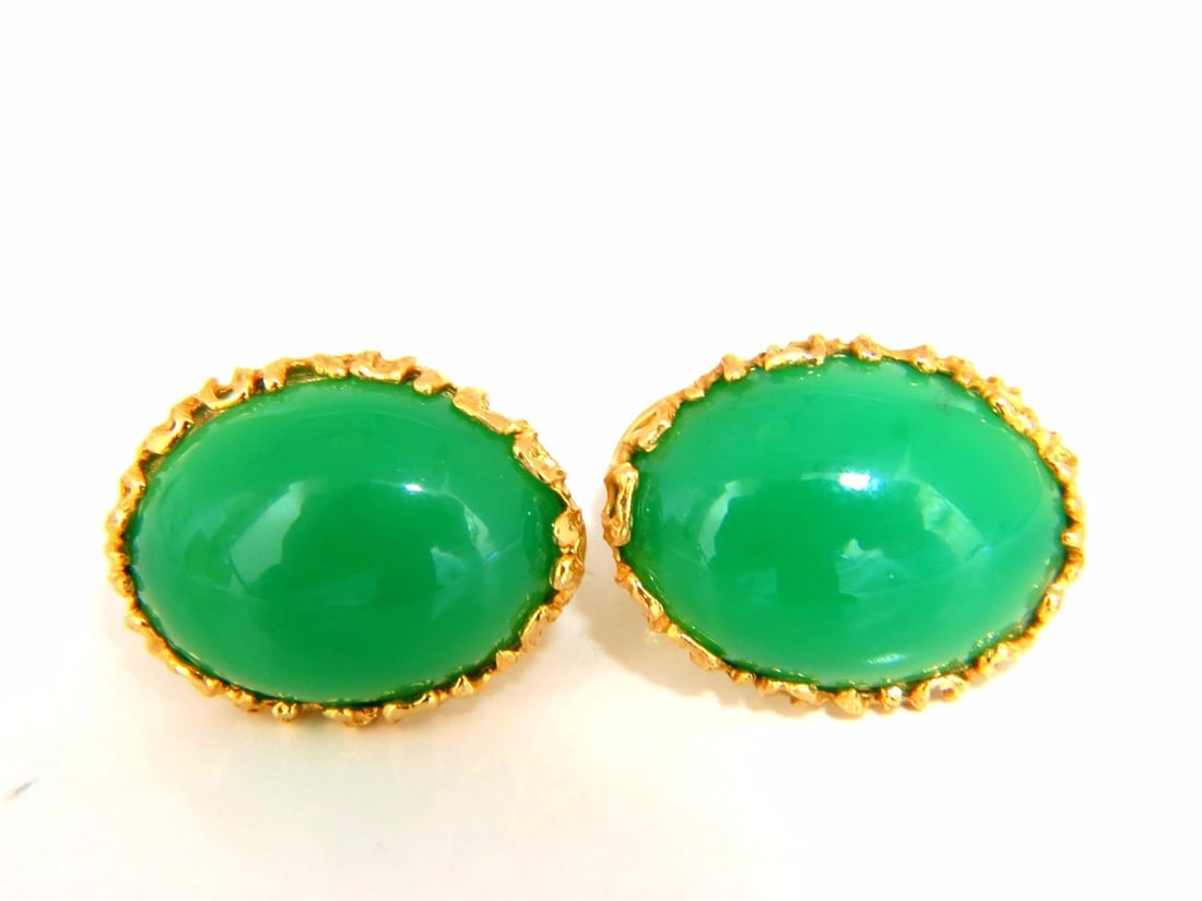 24ct Green Stone Earring Clips 14kt gold**: Title: 24ct Green Stone Earring Clips 14kt gold** Description: Unknown Greens 24.00ct. earrings. Cabochon cut 18 X 15mm Opaque, pistachio green color 14kt. yellow gold 11 grams. Earrings measure: .85 