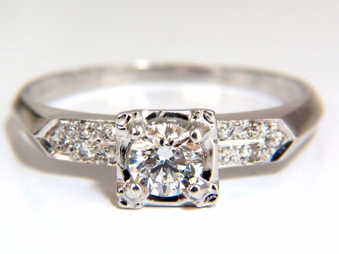 .55ct natural round diamonds vintage raised deck ring 14kt**: Title: .55ct natural round diamonds vintage raised deck ring 14kt** Description: MAGNIFICENT JEWELS .55ct. Natural Round brilliant diamond Si-1 clarity / G color. 5.2mm Diameter Side diamonds: .12ct. 