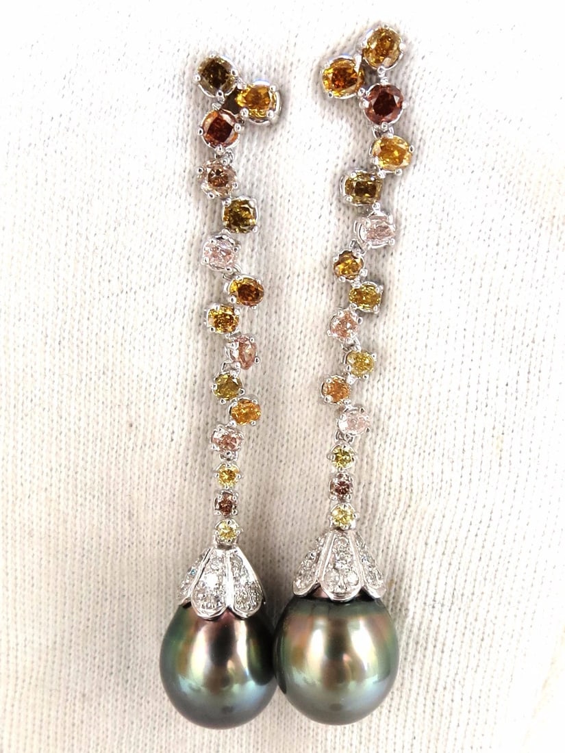 12.70mm NATURAL TAHITIAN PEARLS DANGLE COLOR DIAMOND EARRINGS 14KT**: Title: 12.70mm NATURAL TAHITIAN PEARLS DANGLE COLOR DIAMOND EARRINGS 14KT** Description: Peacock Color Dangles 12.70mm Natural Tahitian peacock pearls Gorgeous green overtone & slight pink fade.