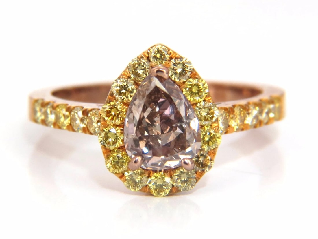 GIA Certified 2.04ct. Fancy Pink Diamond Ring 18kt *v: Title: GIA Certified 2.04ct. Fancy Pink Diamond Ring 18kt *v Description: Pear Pink GIA Certified 1.04ct Pear cut diamond ring. Fancy Pink Brown color Si-2 clarity Report Id: 1169283945 Please see