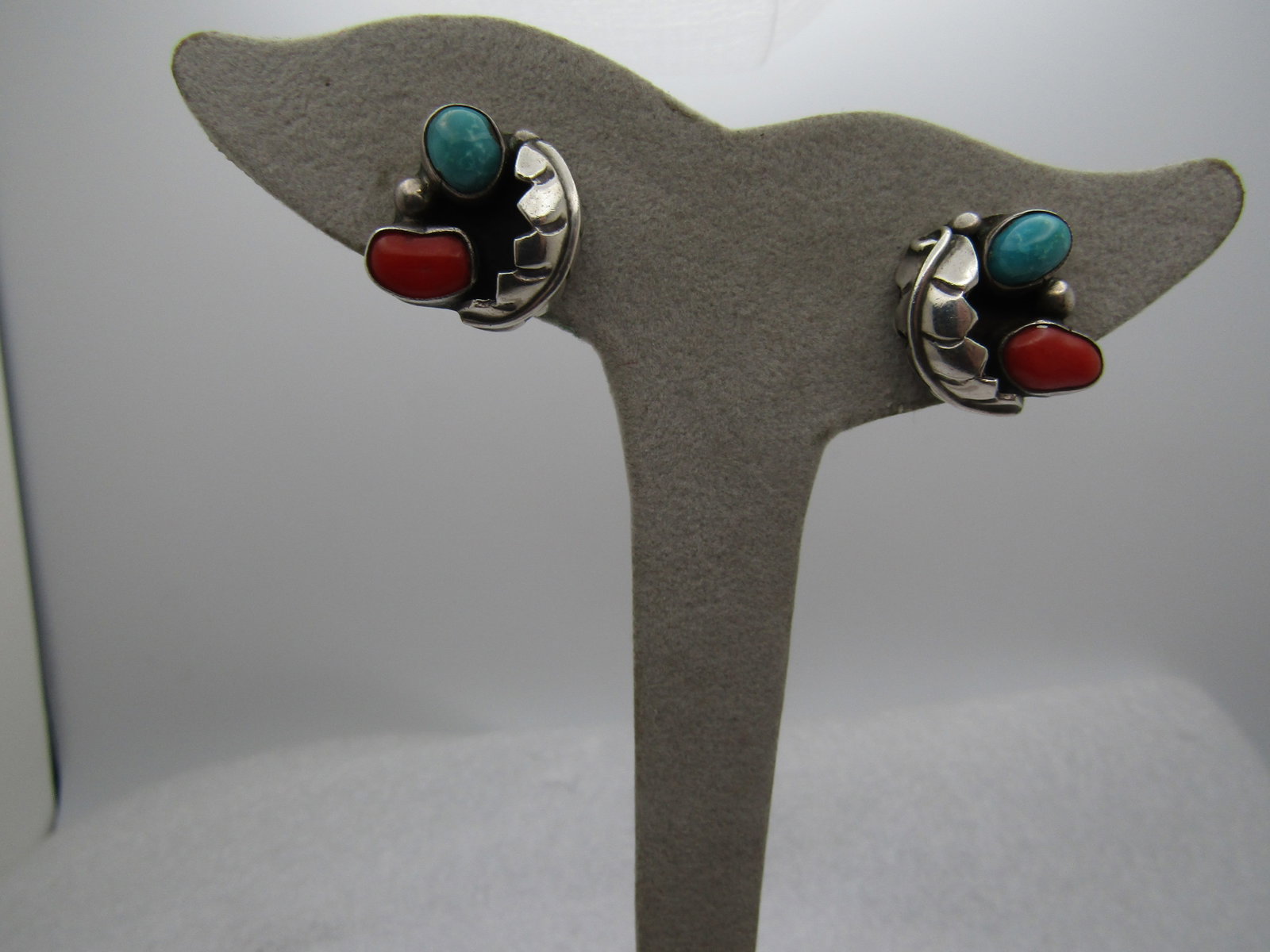 Vintage Sterling Southwestern Turquoise Coral Earrings, Clip, 1960's-1970's, Signed: Vintage Sterling Southwestern Turquoise Coral Earrings, Clip, 1960's-1970's, Signed K.C. Shadowbox design with a curved feater on one side and a bezel-set coral and turquoise stone with a silver bead 