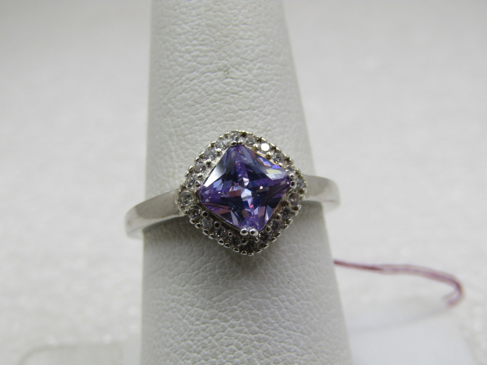 Sterling Amethyst CZ Halo Ring, Sz. 7.75: Sterling Amethyst CZ Halo Ring, Sz. 7.75. 6mm square amethyst cz with a halo fo clear stones. Marked .925, tested, weight is papx. 2.80 gr. Very good condition. Not signed by maker. (INVW11621.1X6 SS5